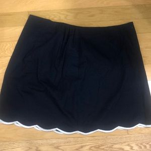 Talbots navy skirt with white scalloped piping on the hem